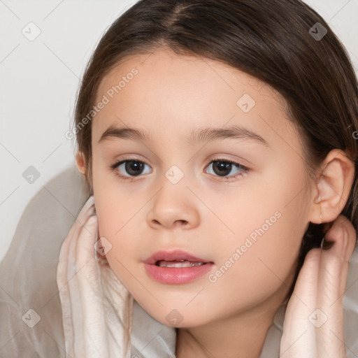 Joyful white child female with medium  brown hair and brown eyes