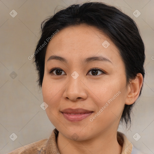 Joyful asian young-adult female with medium  brown hair and brown eyes