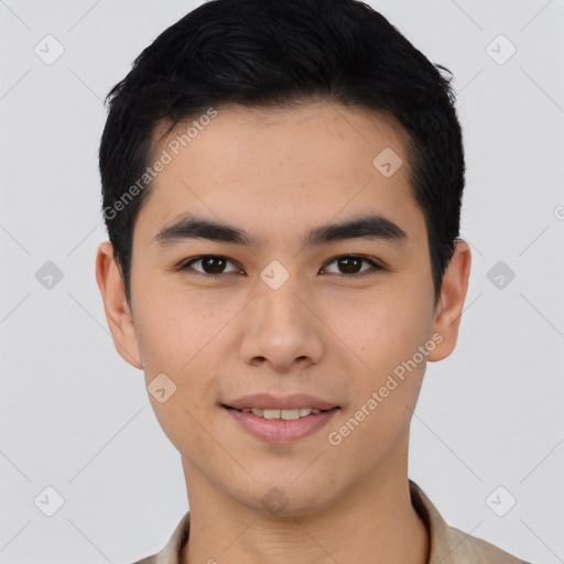 Joyful asian young-adult male with short  black hair and brown eyes