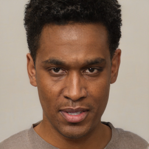 Neutral black young-adult male with short  black hair and brown eyes