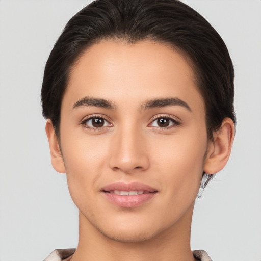 Joyful white young-adult female with medium  brown hair and brown eyes