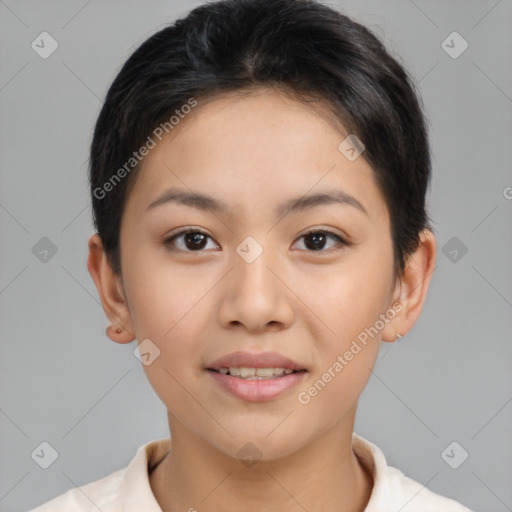 Joyful asian young-adult female with short  brown hair and brown eyes