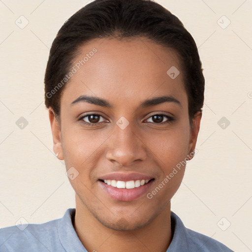 Joyful white young-adult female with short  brown hair and brown eyes