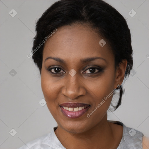 Joyful black young-adult female with medium  black hair and brown eyes