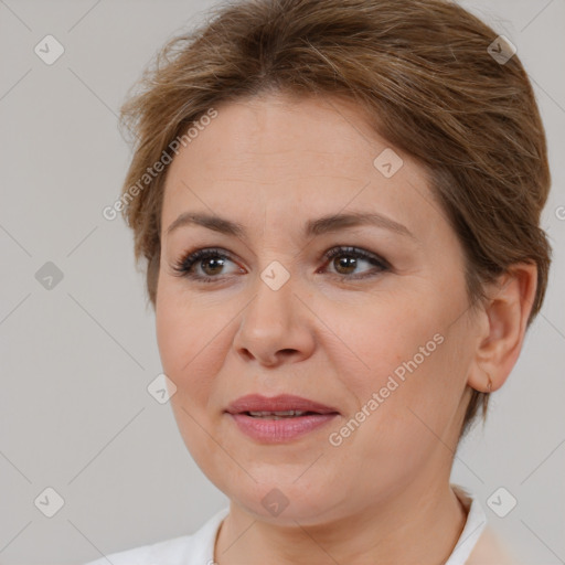 Joyful white adult female with medium  brown hair and brown eyes