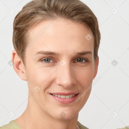 Joyful white young-adult female with short  brown hair and grey eyes