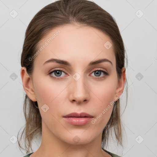 Neutral white young-adult female with medium  brown hair and grey eyes