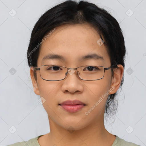 Joyful asian young-adult female with medium  brown hair and brown eyes