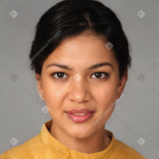 Joyful latino young-adult female with short  brown hair and brown eyes