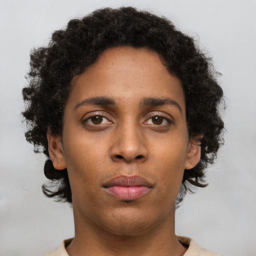 Neutral black young-adult female with short  brown hair and brown eyes