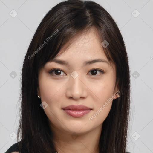 Joyful asian young-adult female with long  brown hair and brown eyes