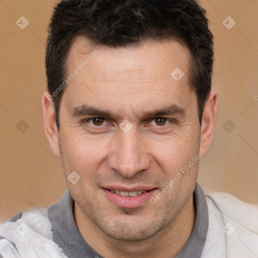 Joyful white adult male with short  brown hair and brown eyes