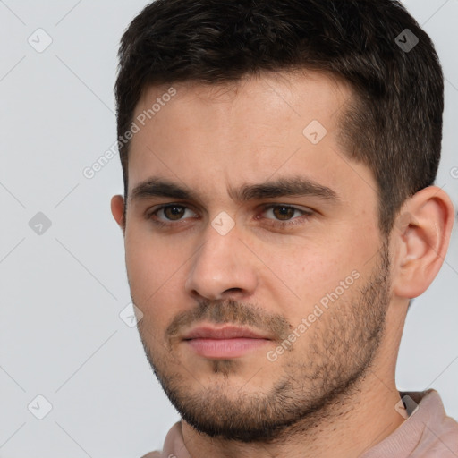 Neutral white young-adult male with short  brown hair and brown eyes