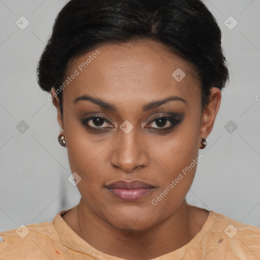 Joyful latino young-adult female with short  brown hair and brown eyes