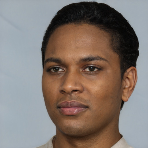 Neutral black young-adult male with short  black hair and brown eyes
