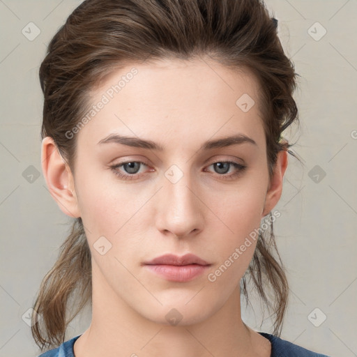 Neutral white young-adult female with medium  brown hair and grey eyes