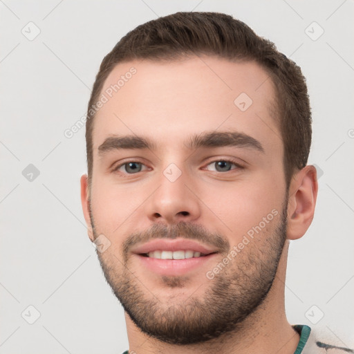 Neutral white young-adult male with short  brown hair and brown eyes