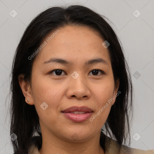 Joyful asian adult female with long  brown hair and brown eyes