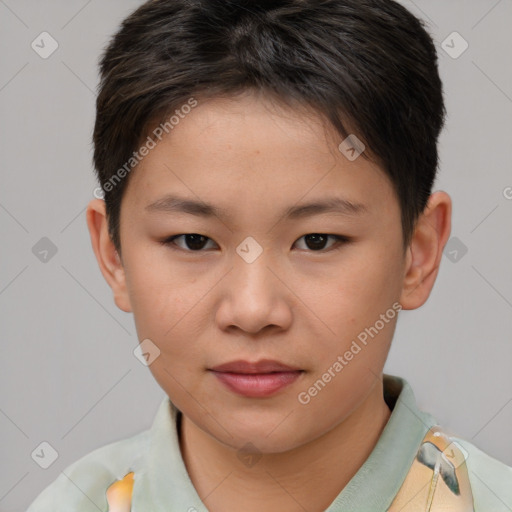 Joyful asian child female with short  brown hair and brown eyes