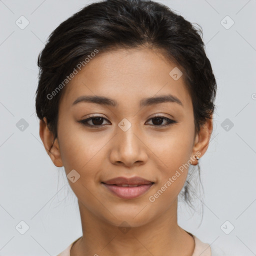 Joyful latino young-adult female with short  brown hair and brown eyes