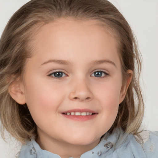 Joyful white child female with medium  brown hair and grey eyes