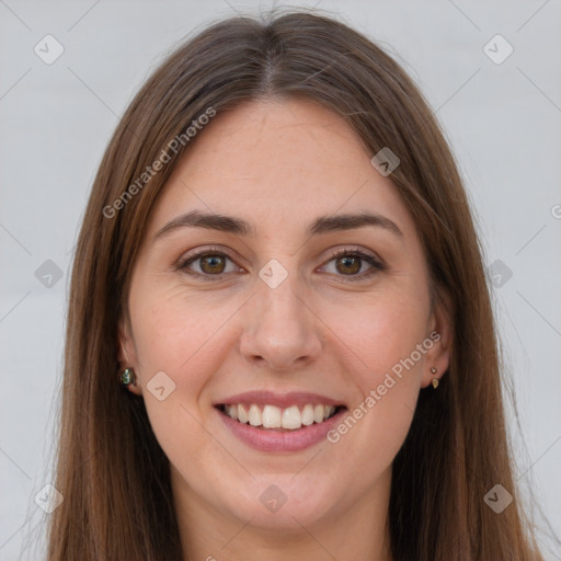 Joyful white young-adult female with long  brown hair and green eyes