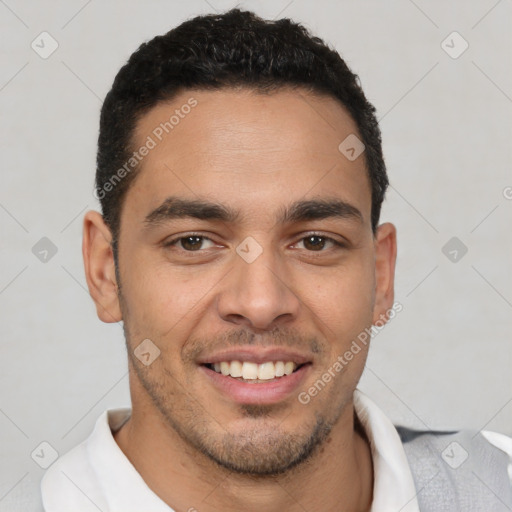 Joyful latino young-adult male with short  black hair and brown eyes