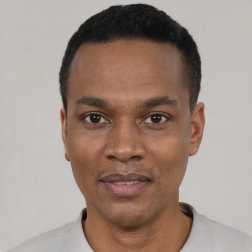 Neutral black young-adult male with short  black hair and brown eyes