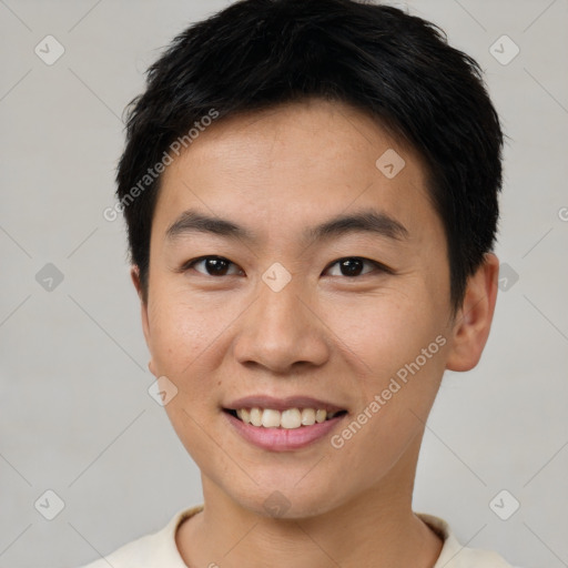 Joyful asian young-adult male with short  brown hair and brown eyes