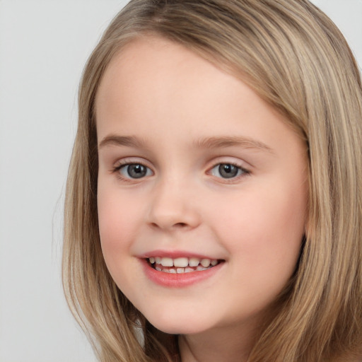 Joyful white child female with long  brown hair and brown eyes