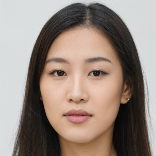 Neutral asian young-adult female with long  brown hair and brown eyes