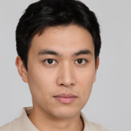 Neutral asian young-adult male with short  brown hair and brown eyes