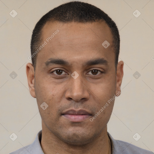Neutral latino young-adult male with short  black hair and brown eyes