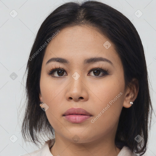 Neutral asian young-adult female with medium  black hair and brown eyes