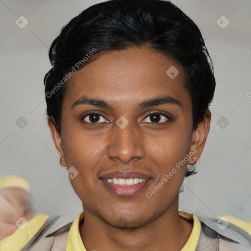 Joyful latino young-adult female with short  black hair and brown eyes