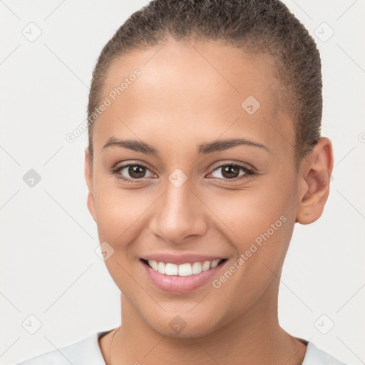 Joyful white young-adult female with short  brown hair and brown eyes