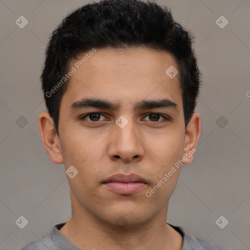 Neutral latino young-adult male with short  black hair and brown eyes