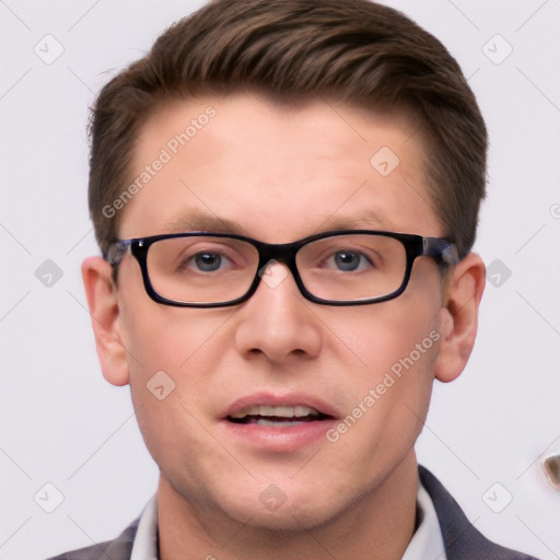 Joyful white young-adult male with short  brown hair and grey eyes