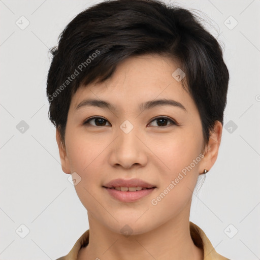 Joyful asian young-adult female with short  black hair and brown eyes