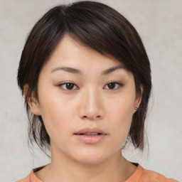 Neutral asian young-adult female with medium  brown hair and brown eyes