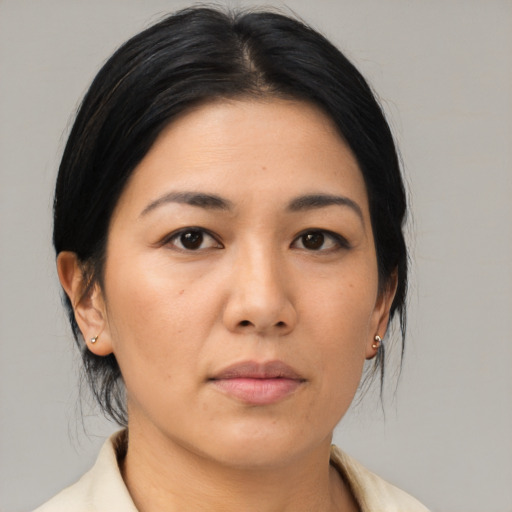 Neutral asian young-adult female with medium  black hair and brown eyes