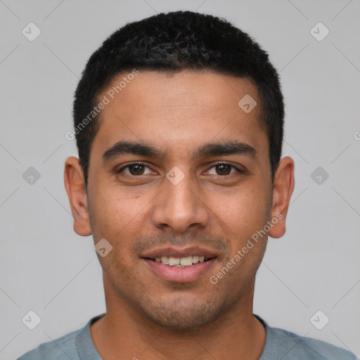 Joyful white young-adult male with short  black hair and brown eyes