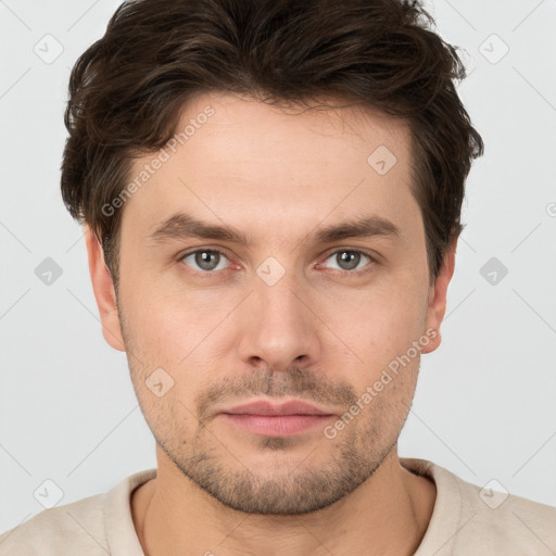 Neutral white young-adult male with short  brown hair and brown eyes