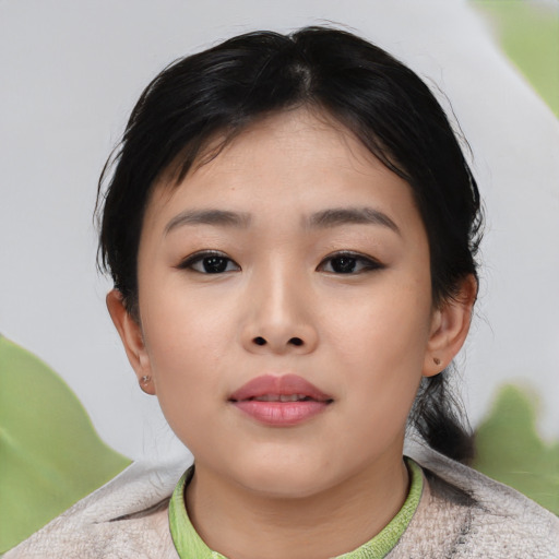 Neutral asian child female with short  black hair and brown eyes