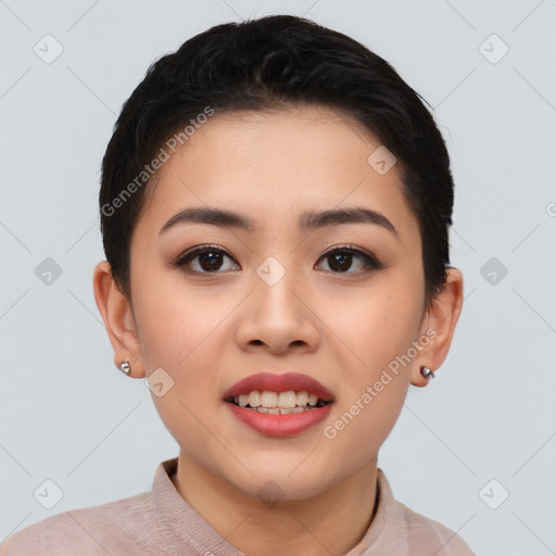 Joyful asian young-adult female with short  black hair and brown eyes