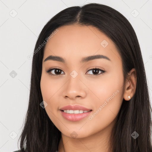 Joyful latino young-adult female with long  black hair and brown eyes