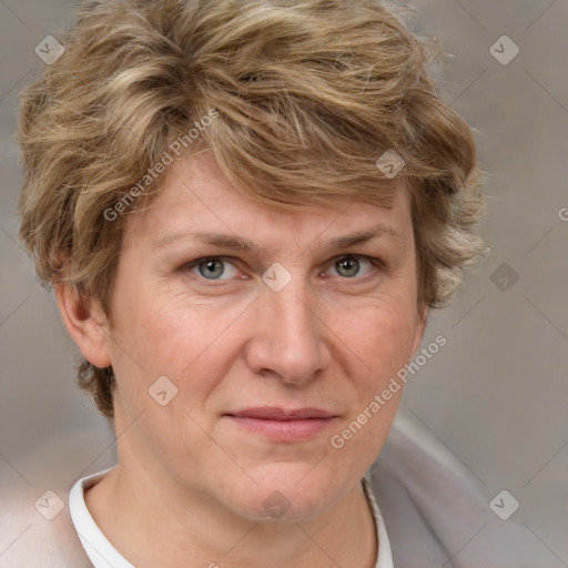 Joyful white adult female with short  brown hair and grey eyes