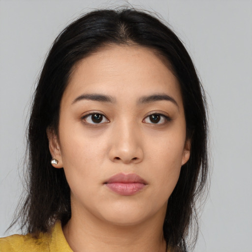 Neutral asian young-adult female with medium  brown hair and brown eyes