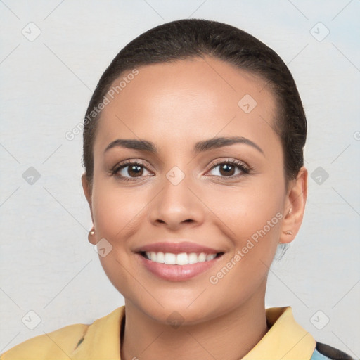 Joyful white young-adult female with short  brown hair and brown eyes