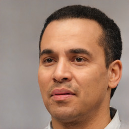 Neutral white adult male with short  black hair and brown eyes